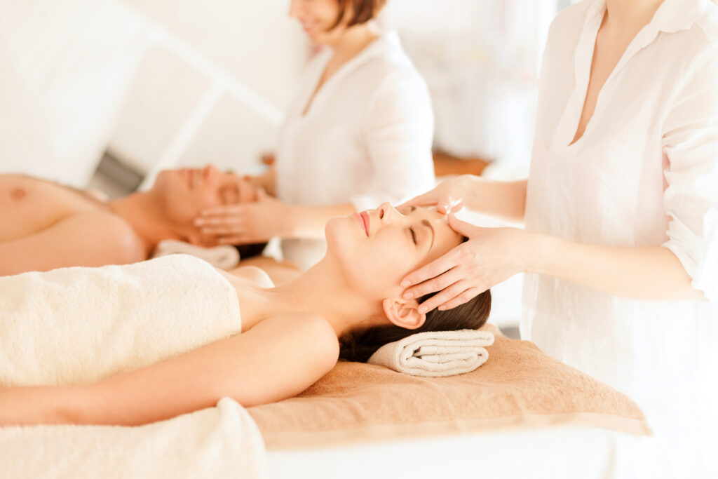 health beauty resort relaxation concept couple spa salon getting facial massage